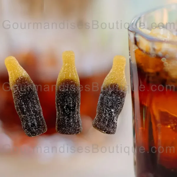 Bonbon géant au cola - Sucrerie citrique/acidulée en forme de bouteille de cola (marque Vidal).